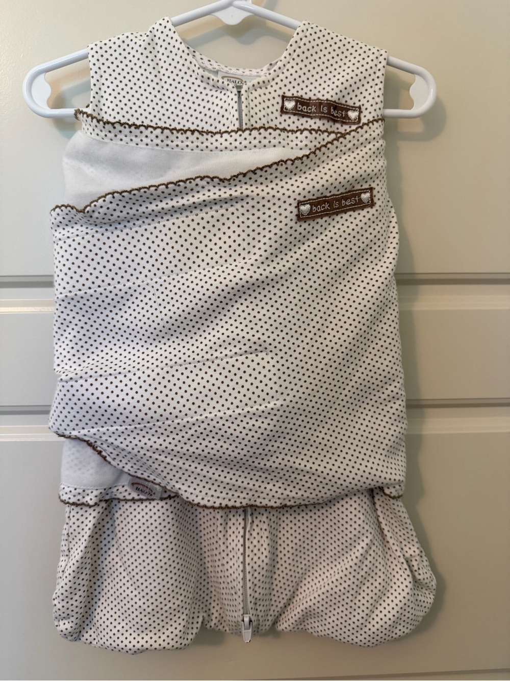 Halo SleepSack Swaddle in White with Brown Polka Dots